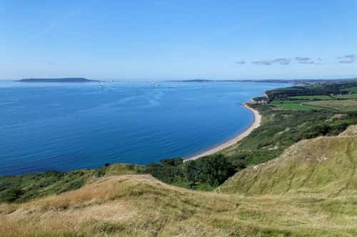 View from Burning Cliff to Ringstead Bay and the Isle of Portland, Dorset, UK, August 2023