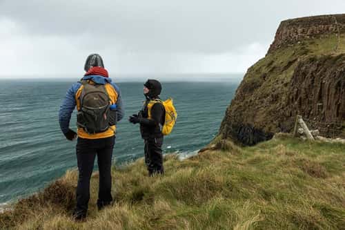 Team members of the Rathlin Island LIFE Raft project assessing the island for the upcoming ferret eradication, Northern Ireland, UK, March