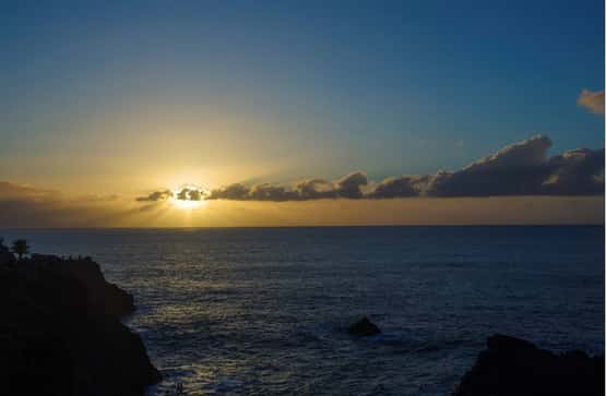 Sunset over Atlantic Ocean viewed from west coast at Los Gigantes, Tenerife, Canary Islands, April