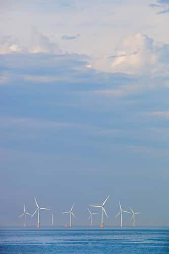 Wind turbines, offshore array and service boat close to Liverpool, Irish Sea, September 2011