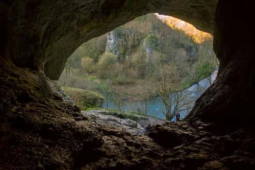 Large cave looking outrwards towards the River Dove, Doveholes, Dovedale, Peak District National Park, Derbyshire, February