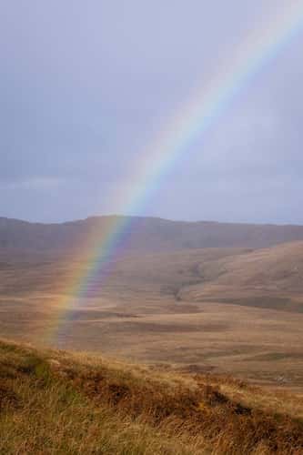 Rainbow over blanket bog, Jura, Scotland, UK, October